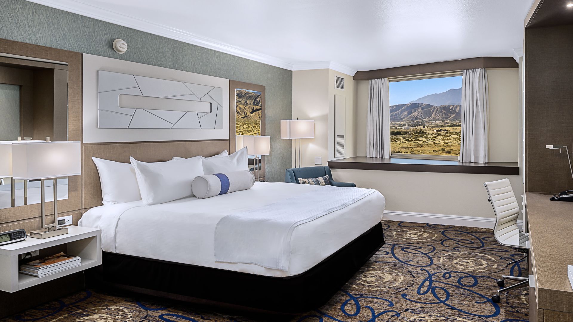 A Bedroom With A Bed In A Room