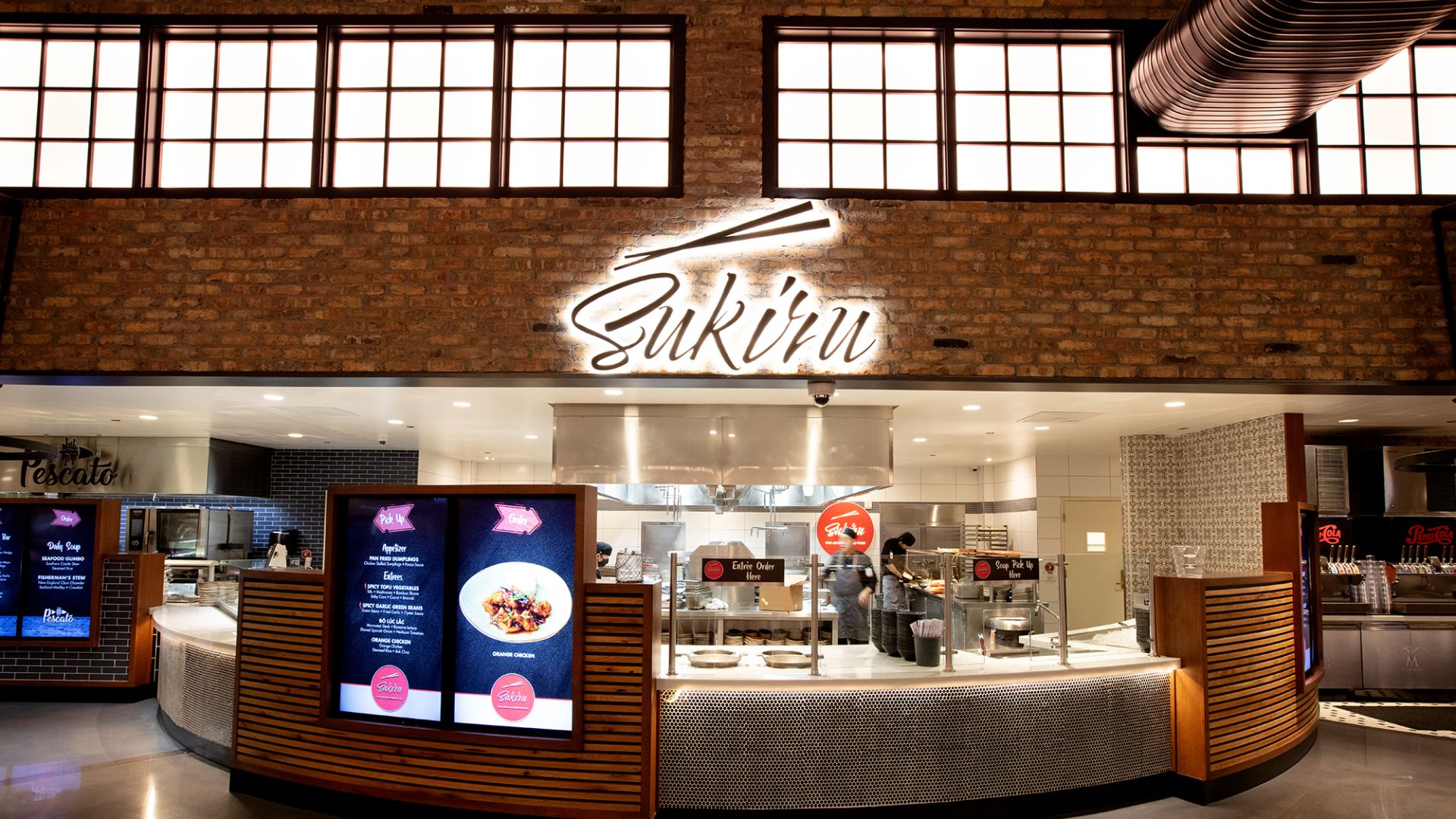 A Large Room With A Large Sign And A Large Display Of Products