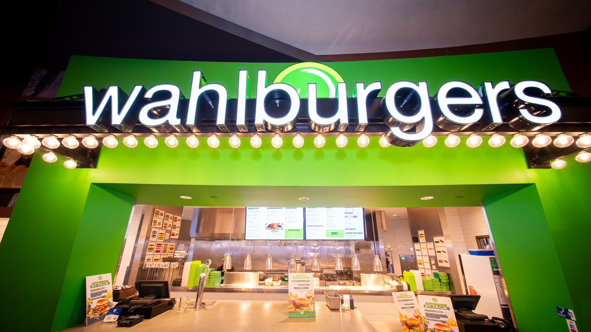 A Store With A Green Wall